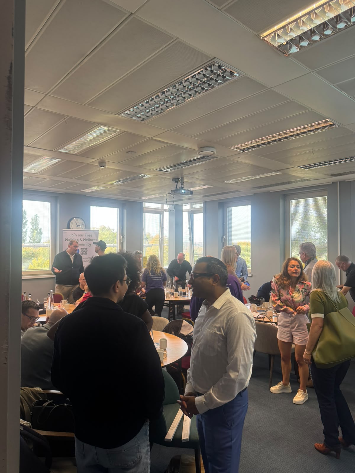 Business owners sharing ideas at an AI Cyclops Business Club event